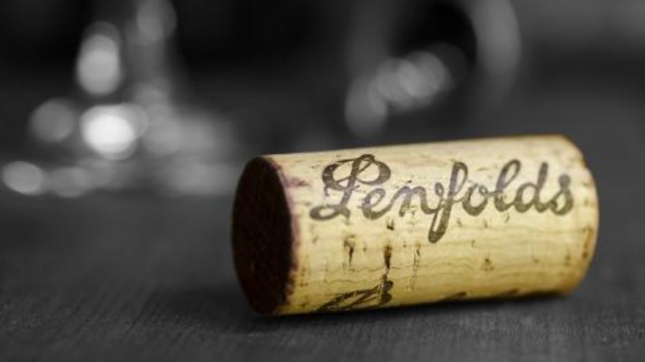 One wine cork that has Penfolds written in fancy font